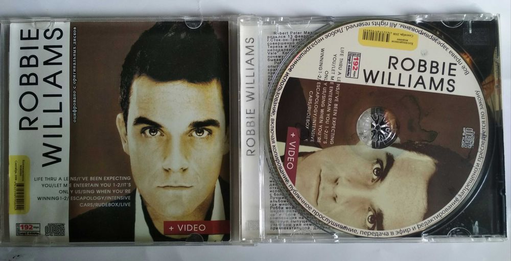 Лицензионный диск robbie williams.Music