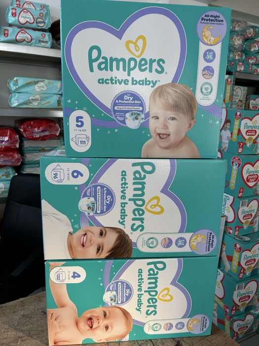 Firma vinde Scutece Pampers și Huggies la pret de importator