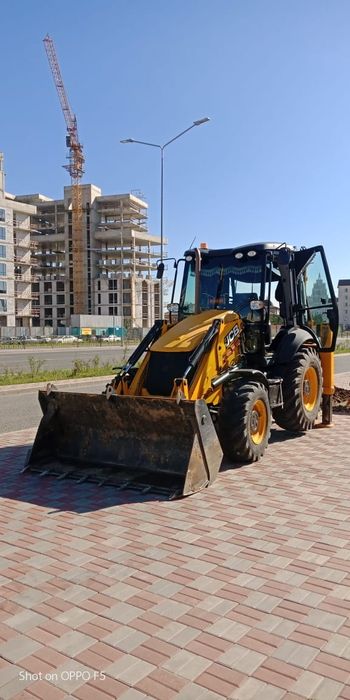 Услуги экскаватора погрузчика с ямобуром