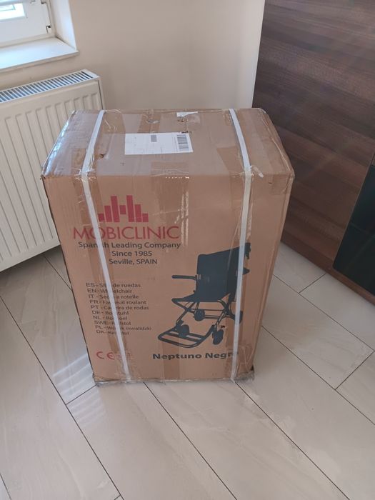 Scaun cu roti portabil si pliabil