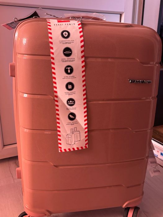 Troller mare rigid, nou, culoare rose-gold, cu roți și cifru 23Kg