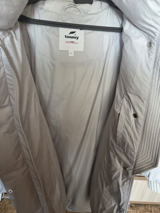 Продам пуховик новый