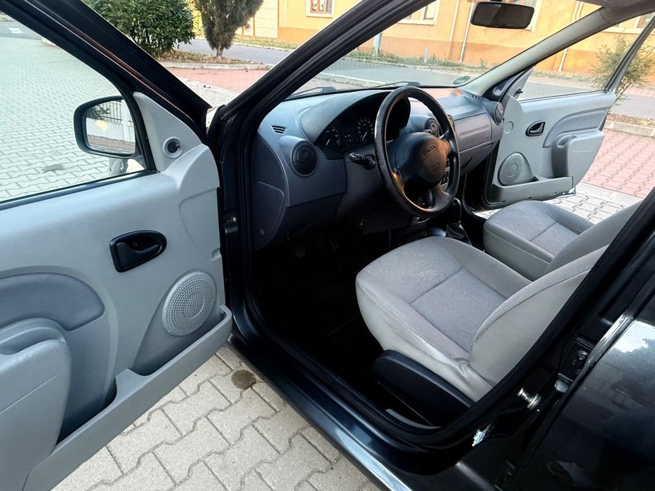 Dacia Logan MCV Logan 1.4mpi an 2009 climă