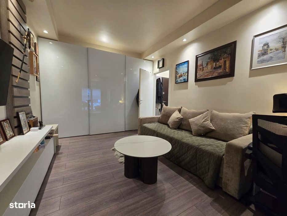 COSMOPOLIS - Apartament cu 2 camere si gradina, mobilat si utilat.