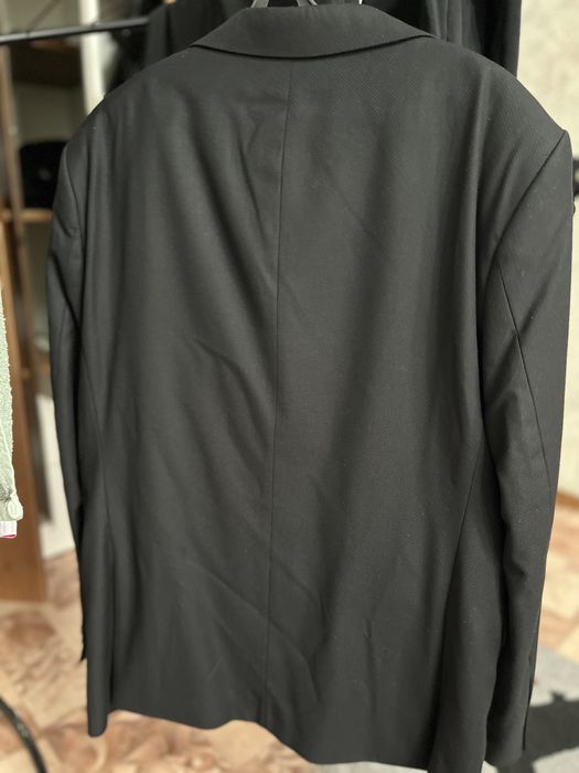 Продам костюм новый