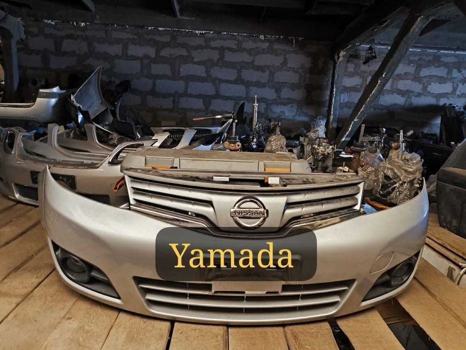 Nissan Note передний бампер оригинал задний