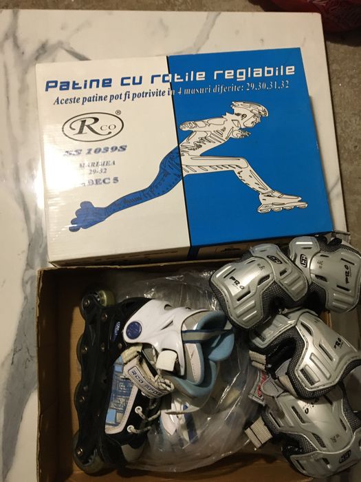 Penny board si role cu echipament de protectie