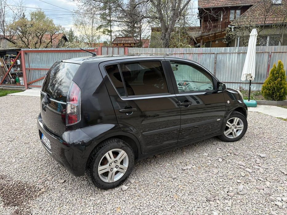 Daihatsu Sirion 2009,  1.3 (91 CP), benzin