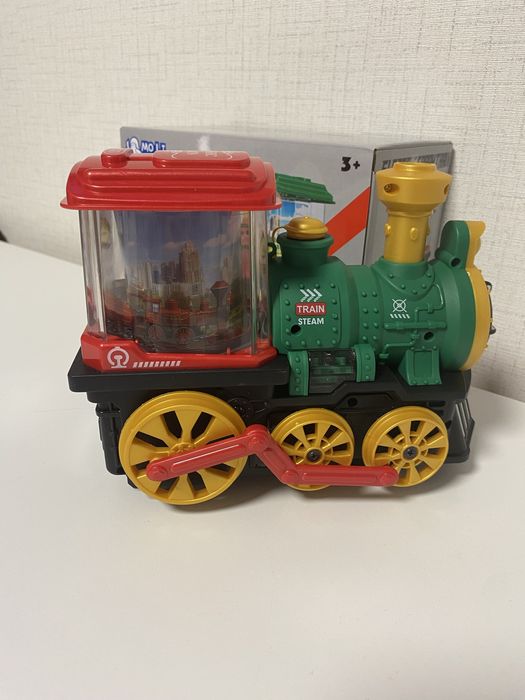 Детски музикален локомотив с пушек, светлини и въртящи се картинки