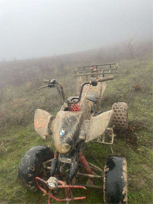 Vand un atv de 125cc