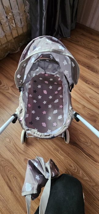 Детская коляска игрушечная