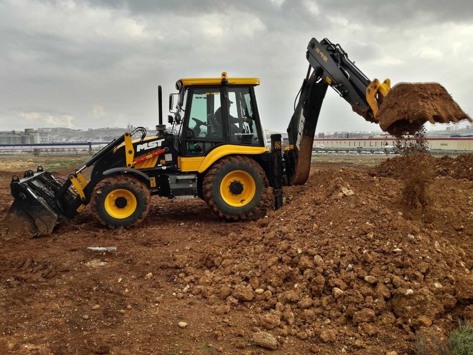 Аренда экскаватора погрузчика MST M542 и фронтального погрузчика XCMG