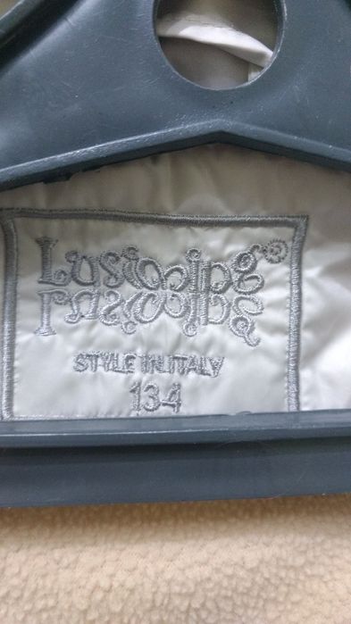 Куртки на девочку 7-8лет