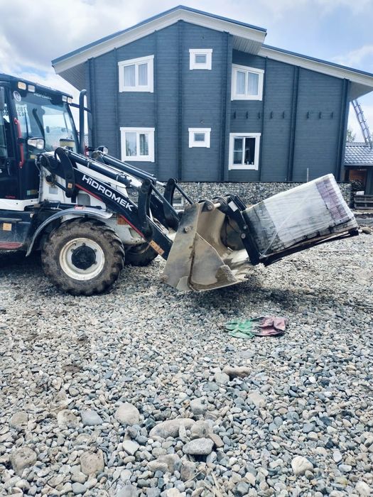 Услуги экскаватора-погрузчика.