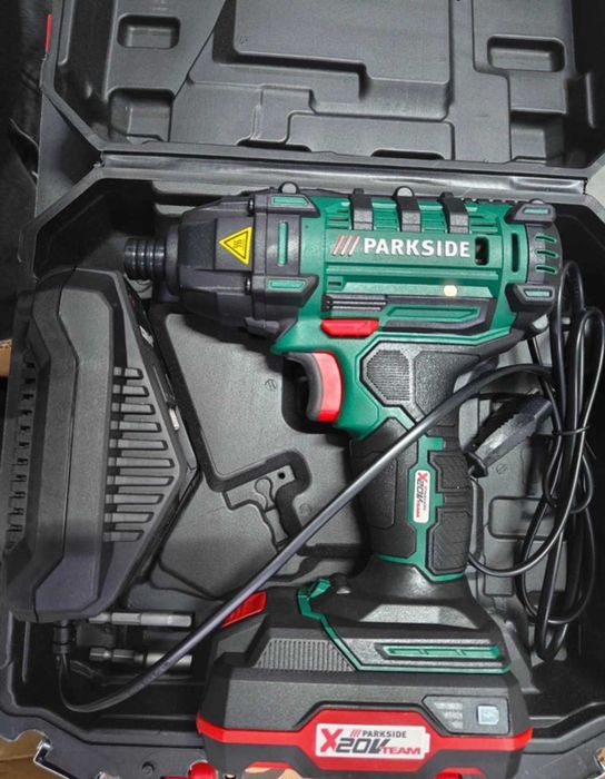 Masina de insurubat si gaurit cu impact Parkside cu acumulator si incarcator inclus. Nou, sigilat