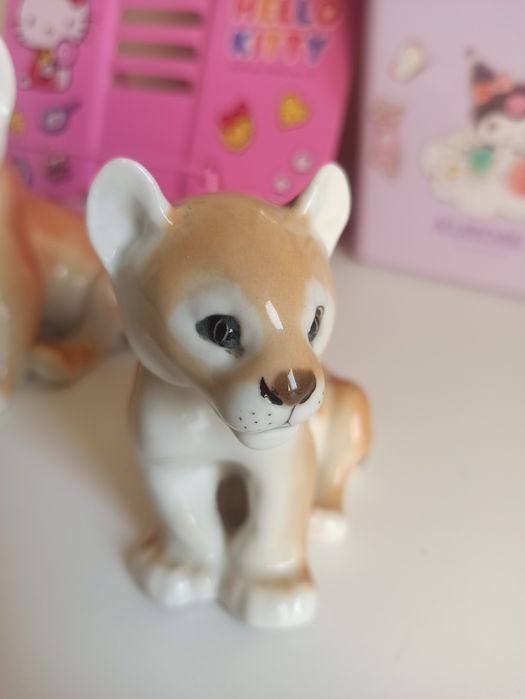 Статуэтки львята