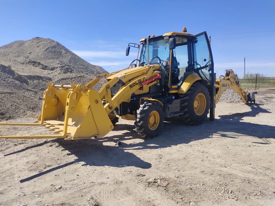 Услуги Эксковатор-Погрузчик