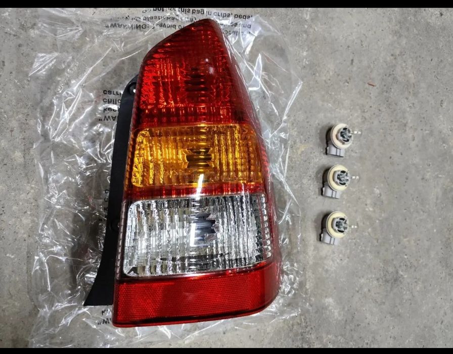 Фонарь фара габарит поворот Мазда Трибут