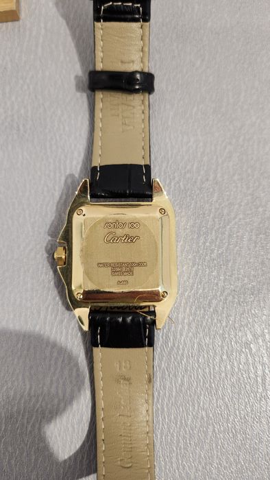 Золотые женские часы Cartier