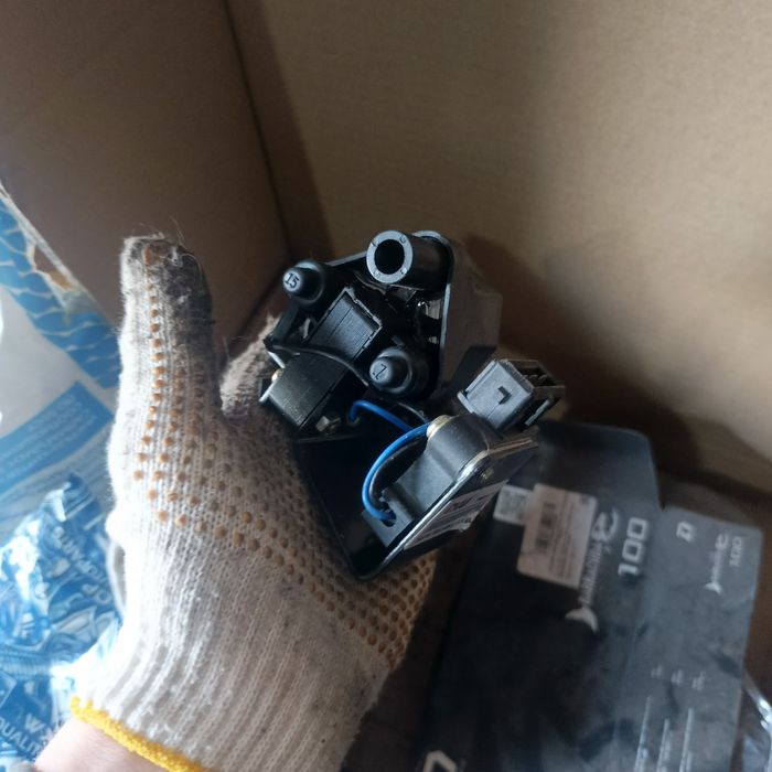 Катушка зажигания Мазда 323f