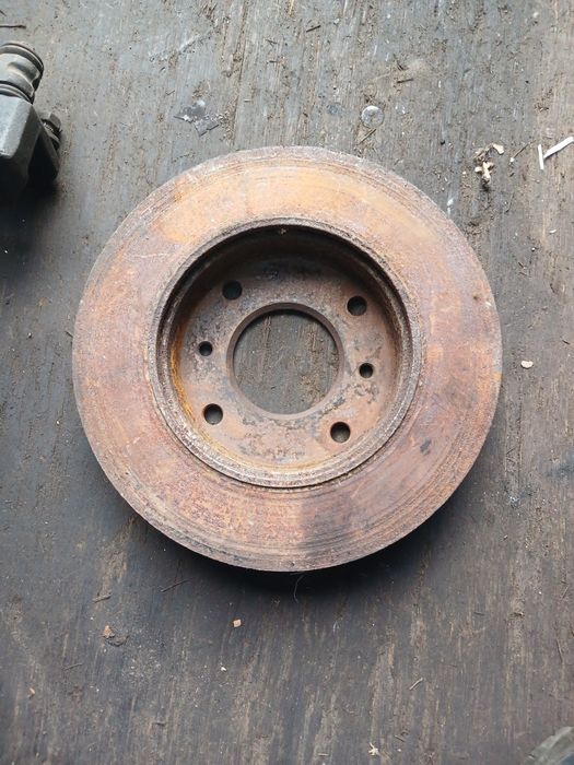 Тормозной диск Нисан Примьера Р10