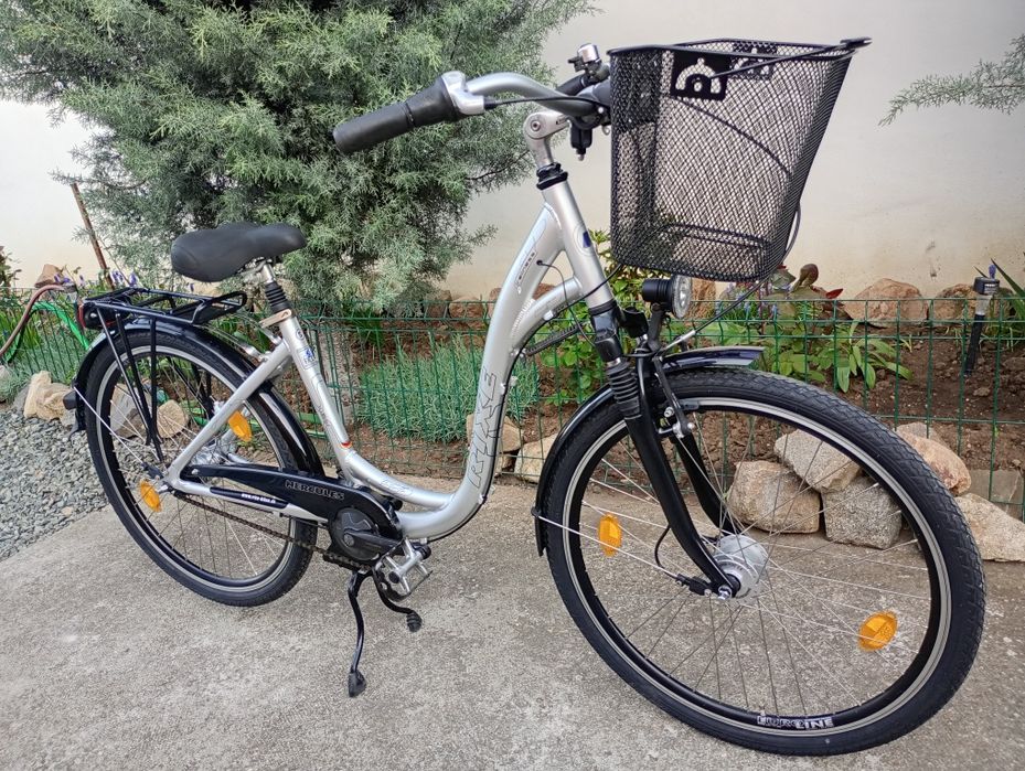 Vand bicicletă damă RIXIE,roți 26,cu 7 vit butuc Nexus !