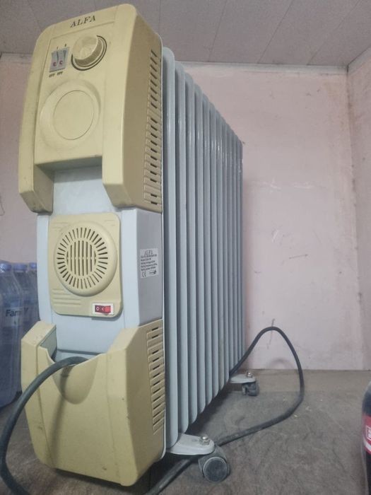 Электрическая печка масленная