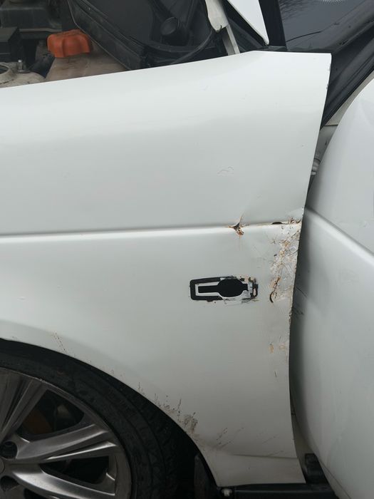 Продам крыло и дверы голы