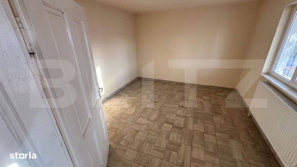 Casa renovata - situata central in satul Aurel Vlaicu