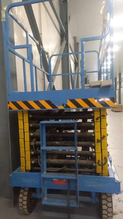 Подъёмник ножнечный