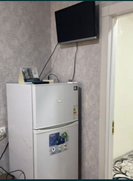 Yangi bozar.  Imarat Inshaat domi yonida