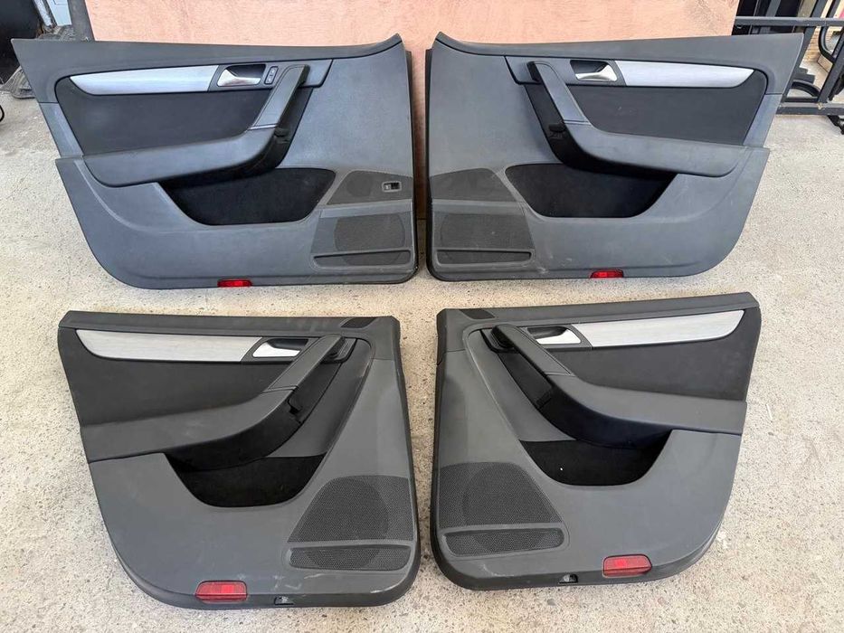 Set fata fete de usa vw passat b7 break cu capitonaj textil negru si trimuri imitatie aluminiu de europa volan stanga