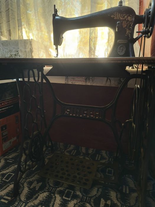 Mașină de cusut Singer