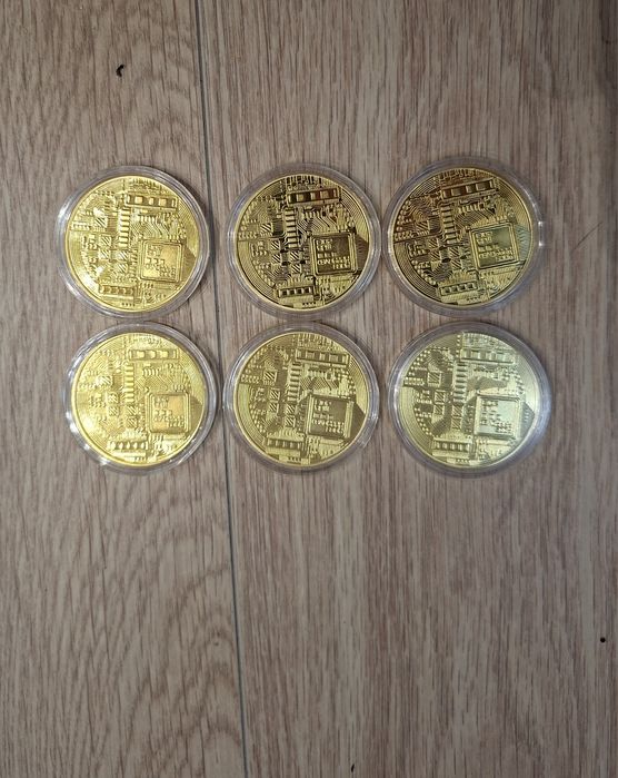 Монети с логото на Биткойн