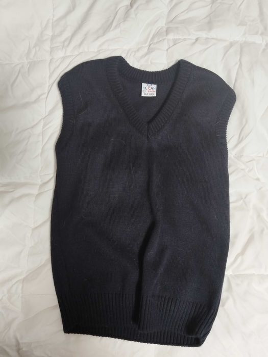 Продам школьные жилетки.