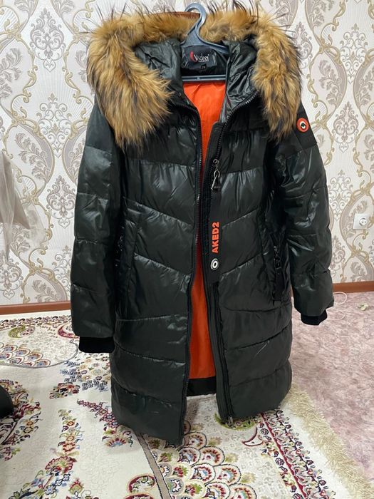 Продам пуховик зимний бу