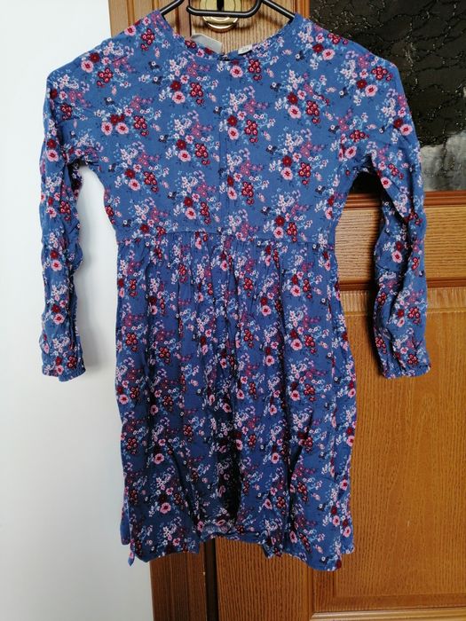 Дрешки 128-134 .