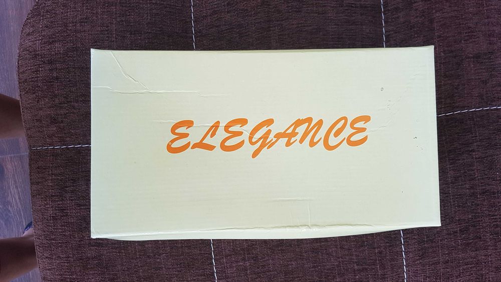 Нови! Елегантни сребристи обувки с панделка. Размер 37