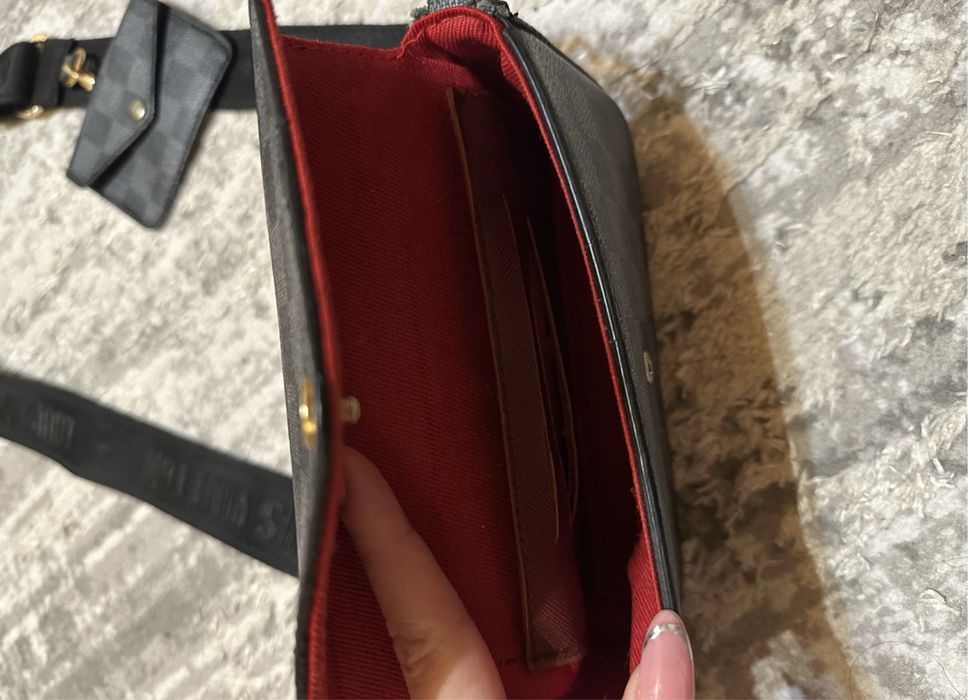 Geanta Louis Vuitton.