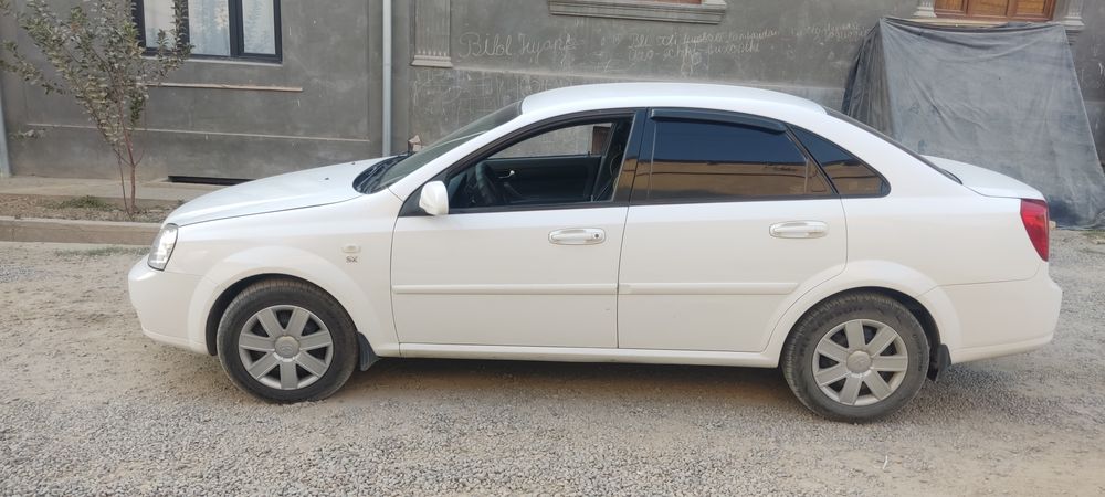 Срочна сотилади Ласетти 2006 йил карески матор