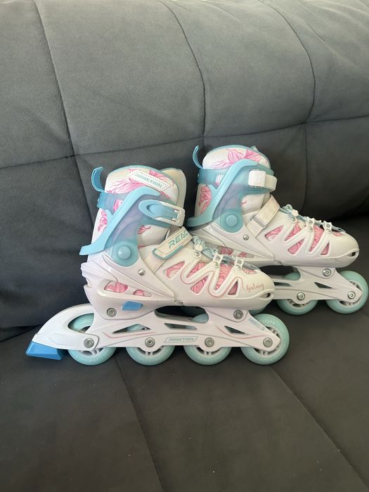 Роликовые коньки