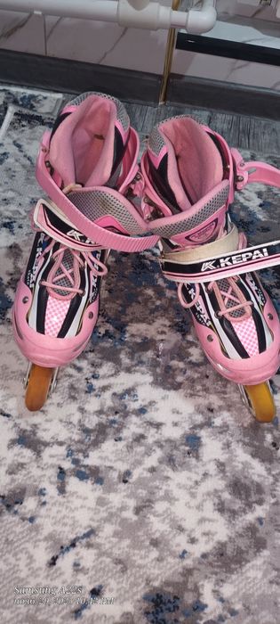 Роликовые коньки.