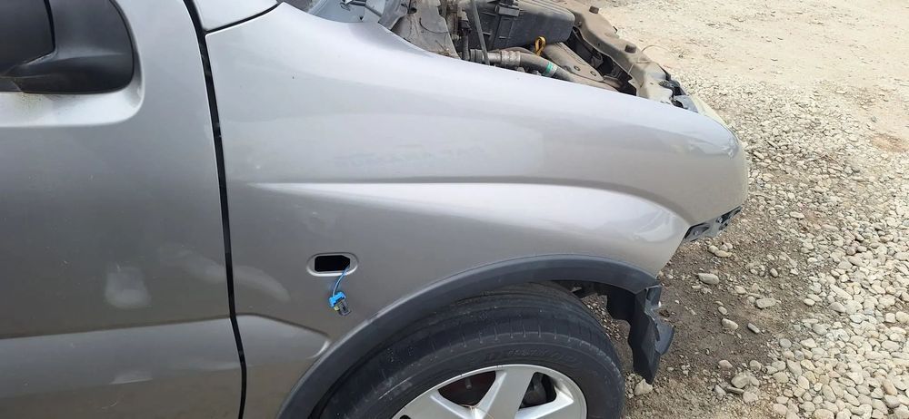 aripa fata dreapta suzuki ignis an 2004-2006