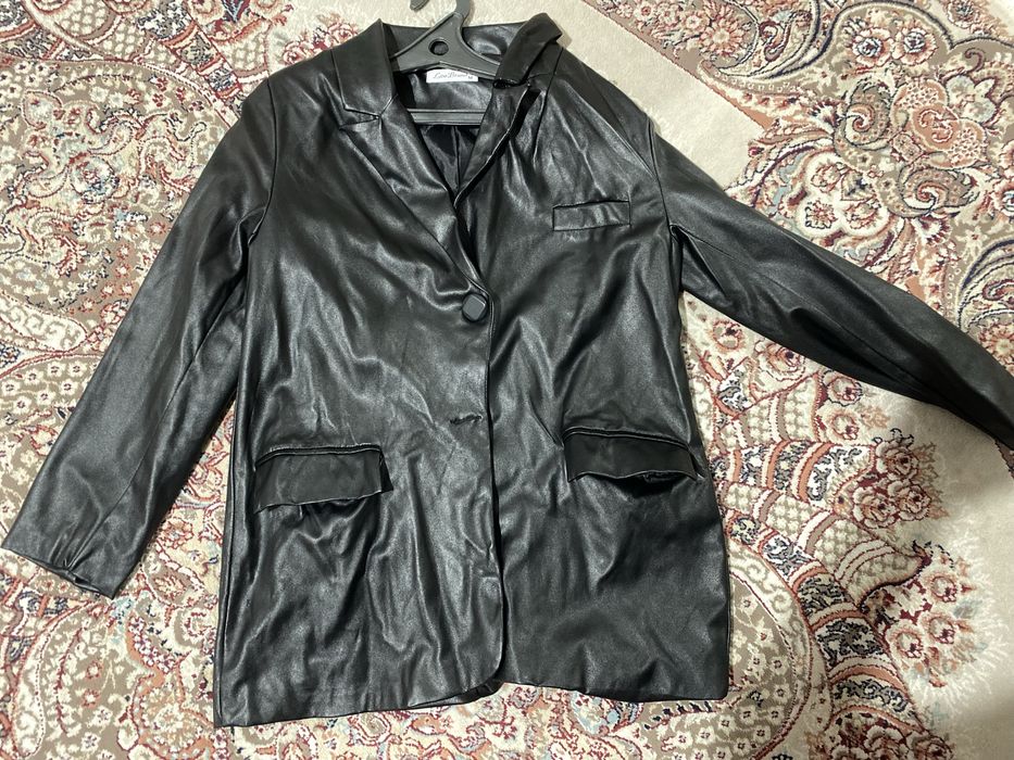 Сырт киімдер киілген