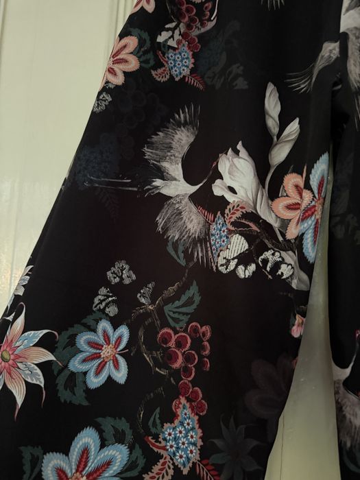 Pantaloni evazati cu imprimeu