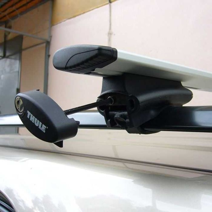 ЗАХВАТИ за напречни греди THULE 775 Rapid Siystem. От passat B7