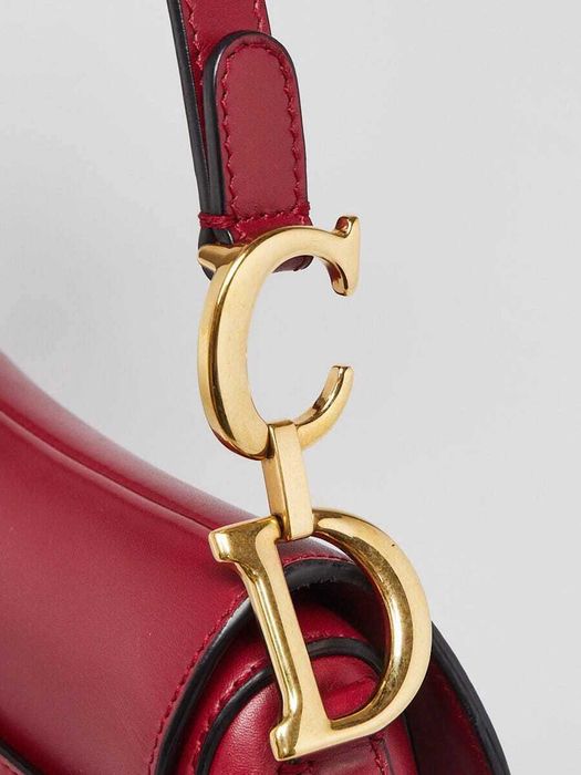 Authentic Dior Saddle bag in burgundy color