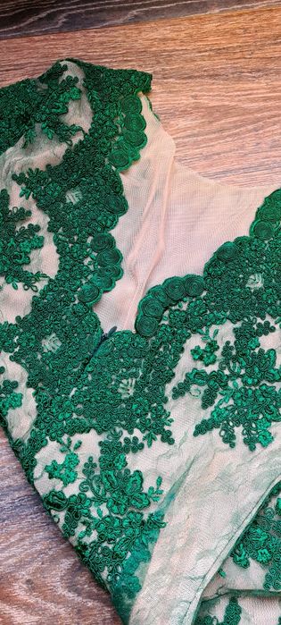 Vând salopeta verde