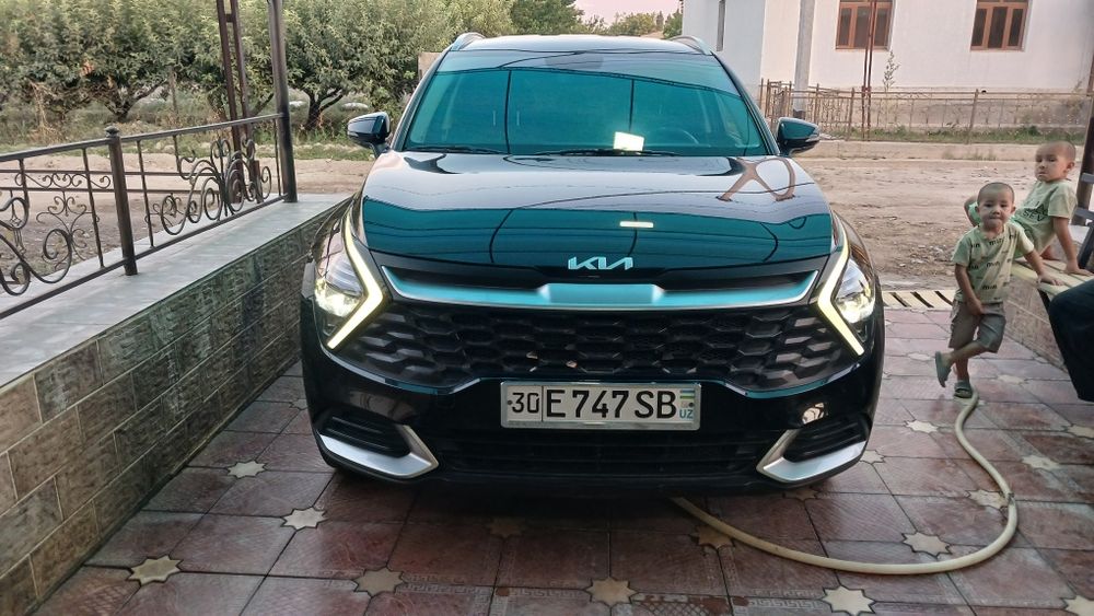 Kia sportage zo'r xolatda