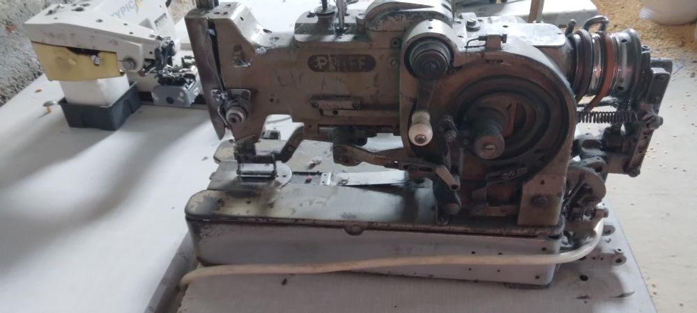 Masini de cusut si sulfilat